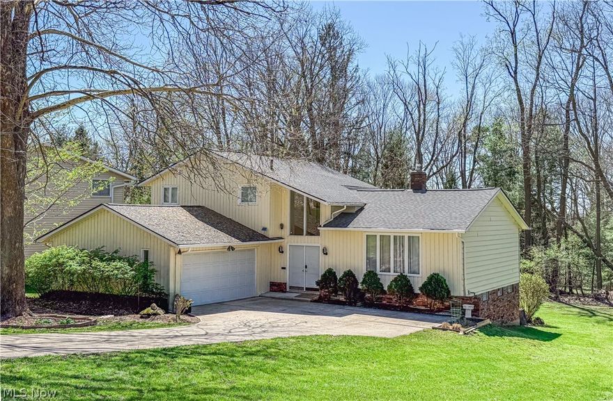 This beautiful North Solon split-level has been meticulously updated, offering modern luxury and peace of mind. From the high-ceilinged living spaces to the expansive, treed backyard, every detail has been curated for comfort and style. Interior Highlights: Open Living Spaces: A large living and dining room featuring soaring high ceilings, perfect for entertaining. Chef’s Kitchen (2025/2026): Completely remodeled in 2025 with custom cabinetry and a high-end sink, topped off with a brand-new refrigerator installed in 2026. Modern Bathrooms (2025): Two full bathrooms fully renovated and styled with contemporary LED mirrors. 
Updated Flooring (2026): Fresh luxury vinyl plank flooring throughout the family room and the finished basement area. Exceptional Living & Entertaining Indoor-Outdoor Flow: The kitchen eating area opens via patio doors to a massive deck overlooking a private  backyard. Cozy Family Room: Features a warm fireplace and a second set of patio doors for easy outdoor access. 
Finished Walkout Basement: A versatile lower level that provides additional living space and direct access to the yard. Total Peace of Mind: New Roof/Gutters/Downspouts (2024), New AC (2025), and updated exterior electrical cable lines (rusted and broken)  (2025). With its extensive list of 2024–2026 upgrades and prime North Solon location, this home represents one great value!