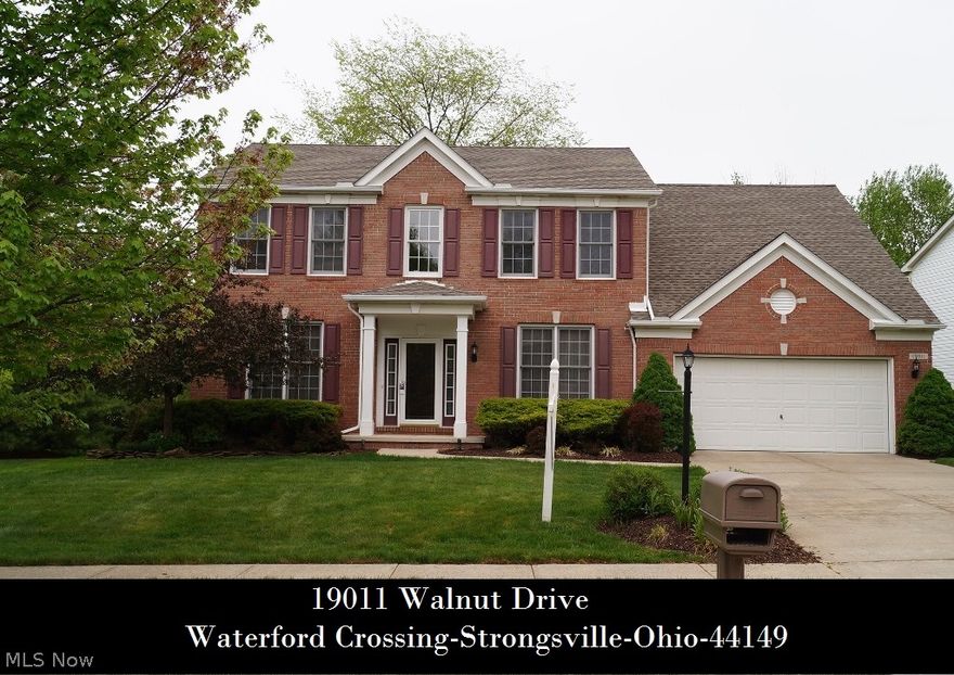 Delightful meticulously kept colonial with full brick front in Waterford Crossing! Elegant 2 story foyer and 9' ceilings on the 1st floor, formal living/dining rooms, spacious eat-in kitchen with glimmering hardwood floors overlooks family room with fireplace, convenient 1st floor laundry, and huge private vaulted master suite with garden bath and walk-in closet! Ceramic tile flooring in laundry & guest bath,  newer roof - hot water tank - disposal - dishwasher, all appliances & 1 year $474 America's Preferred Home Warranty are included! Enormous deck and beautifully landscaped yard! Sprinkler System! Kinsner Elementary School located within the development, residents can take full advantage of their own private community clubhouse, swimming pool, tot lot area, lighted twin tennis courts, volleyball court and meandering green areas.