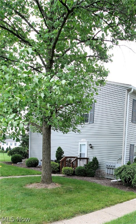 The ultimate in carefree living. Welcome to this two bedroom, one and half bath condo. Come on into the living room, and kitchen with eat in area. The bright, open kitchen has stove, refrigerator, microwave, and has a slider door to let the natural light to shine through and leads to the patio to sit out and enjoy. Upstairs has two bedrooms and a full bathroom and laundry. The finished lower level offers so much more room for entertaining, work out area, etc. Sell your lawnmower! Precious memories begin right here!