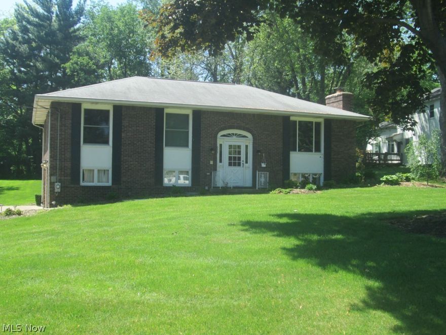 Beautiful brick home in the heart of Perry schools and move in ready. This home has been very well taken care of and has been updated to a high standard. The open floor plan keeps the family engaged and interactive with the beautifully redone kitchen to the large living room. The lower level gives the possibility of a 4th bedroom or office and has a very large family room with a fireplace as well as a 1/2 bath and laundry.  The home boasts a very large yard with a great swing set and a newer very large 12 x 20 shed. The deck will be perfect for your bar-b-ques while the home itself was built for entertaining! Come take a look at this fantastic home and make it your own!