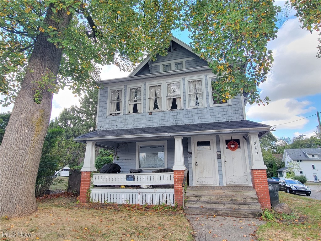 Excellent investment opportunity with this fully occupied triplex! Two spacious 2 bedroom, 1 bathroom units on the 1st and 2nd floors, and a 1 bedroom, 1 bathroom unit on the 3rd floor, generating over $2,000 a month in rent! Each 2 bedroom unit offers a formal dining room and generous size living rooms. Unit 2 also offers a large enclosed porch area. The cute and cozy 1 bedroom unit offers an eat in kitchen and features knotty pine paneling throughout the living space. Owner pays water/sewer/trash, tenants pay all other utilities and maintains the lawn. Great long-term tenants! Many updates throughout including a brand new roof on the house and garage, and new gutters will be installed the first week of October! Convenient location close to Rt 8, downtown Akron, and Cuyahoga Falls! Garage and parking is on a no outlet street!