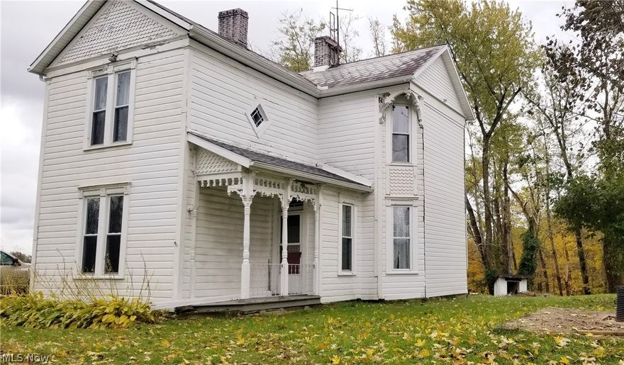 This beautiful historic home offers a large dining room, 3 bedrooms, new carpet and so much more. It is filled with character from the original woodwork and stained glass to the old outhouse building still present in the back yard. You will enjoy the peaceful countryside with approximately 7.5 acres of wooded and pasture land. Come see this country beauty today! Additional land possible.