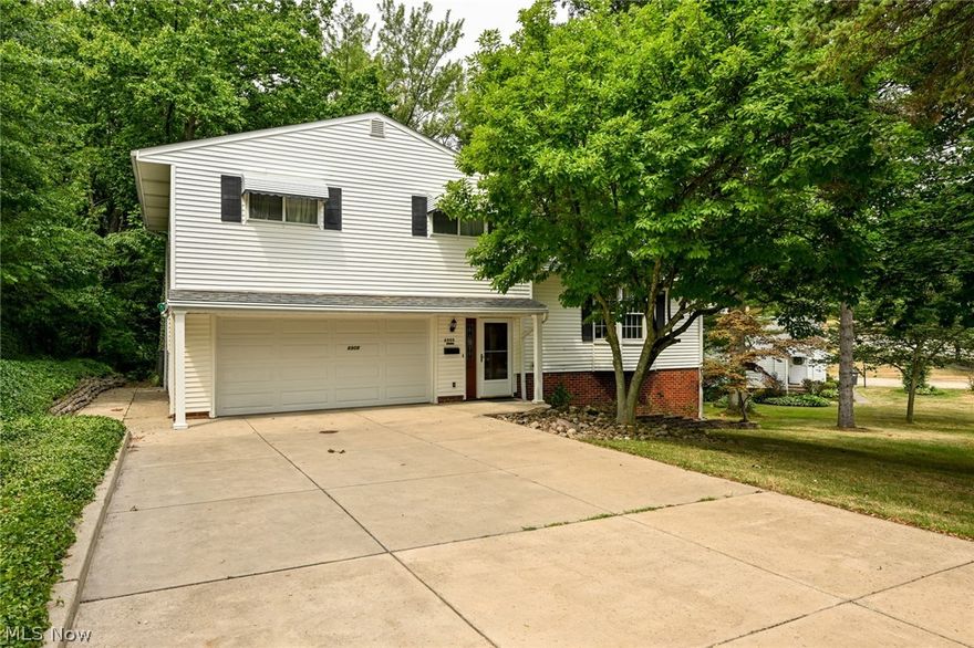 Fantastic opportunity to own a four bedroom, 2 1/2 bath split level home in Independence. Original hardwood floors are under the carpet in the living room and dining room.  Second full bathroom on the main level was added 11 yrs ago.  Front door, windows on main level and slider door to the deck have been updated and second floor windows are original, all appliances remain. Lower level features glass block windows and walk out access to the patio. Recent updates include the hot water tank in 2021 and A/C unit in 2022.  This fully fenced peaceful lot features privacy and a park-like setting.  Relax on the composite maintenance free deck.  Great location, conveniently located to 77 and just a short drive to the heart of Independence for shopping and dining.