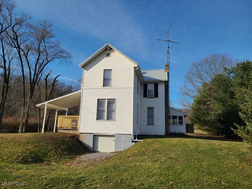 Spacious century home offers 1st floor bath and laundry, 3 bedrooms, additional full bath on upper level. Covered side porch and enclosed porch. Updated paint and carpet, newer roof. Enjoy low utilties with free gas for heat!! Quiet country location.