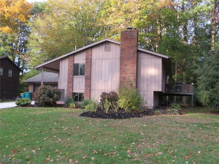 Mint!  Totally Updated & Refreshed!  Vaulted Great Room!  Newly Painted!  New White Trim!  New Kitchen Cabinetry, Granite Tops and Stainless Appliances!  New Baths with Granite Tops!  All New Wood Laminate in Foyer, Great Room, Kitchen, Dining Room, Baths & Hallways!  New High Quality Carpet in Bedrooms & Family Room;  Wet Bar and Woodburning Fireplace with Gas Line in Family Room!  Wrap Deck in Rear and Side;  Brand New Concrete Driveway!  Newer AC, Furnace & Gutters!  Updated Electric and New Electrical Fixtures!  Rear Storage Shed!  Prime Cul de Sac Location!  Immediate Occupancy Available!