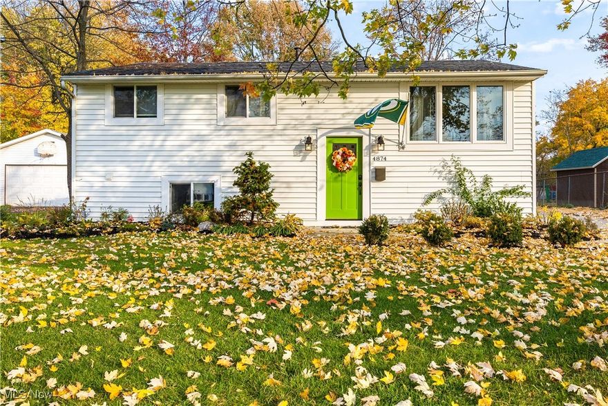 Welcome to 4874 Ronald Drive in North Ridgeville, OH! This beautifully updated home offers easy access to highways and is surrounded by a wealth of shopping and dining options. With four spacious bedrooms and two full baths, this residence is perfect for families or those seeking extra space. The property features a 2.5 oversized garage, providing ample room for vehicles and storage. Recent updates over the last 5.5 years include a new roof, siding, soffits, gutters, and windows, ensuring a fresh and modern exterior. Inside, you'll find a stunning new kitchen with sleek quartz countertops and stylish cabinets, as well as two newly renovated full baths. Additional improvements include a high-efficiency furnace and A/C, a new hot water tank, updated electrical and plumbing, and contemporary lighting, flooring, paint, interior trim, and doors. The exterior has also been refreshed with new trim, doors, driveway, and walkways! All appliances stay making this home move-in ready!!  Don't miss out on this exceptional property!
