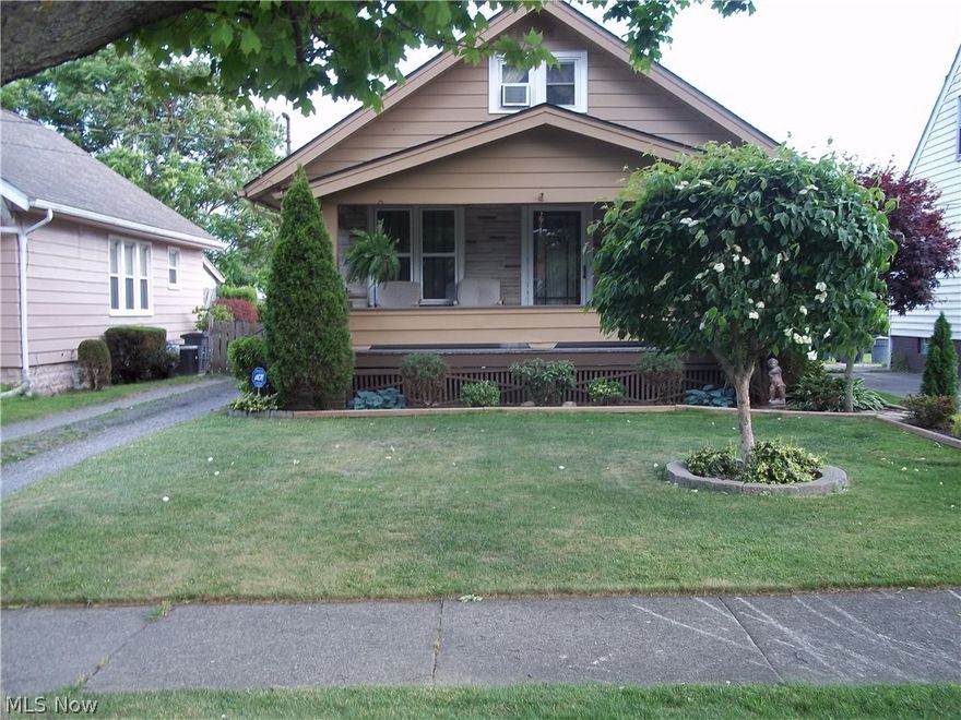 Very clean 3 bedroom Cape Cod with full front porch. Kitchen with granite counter and ceramic tile flooring, Combination Living room and Dining room. 2 bedrooms down and 1 up. Natural wood trim. 2 car detached garage. Private back yard.