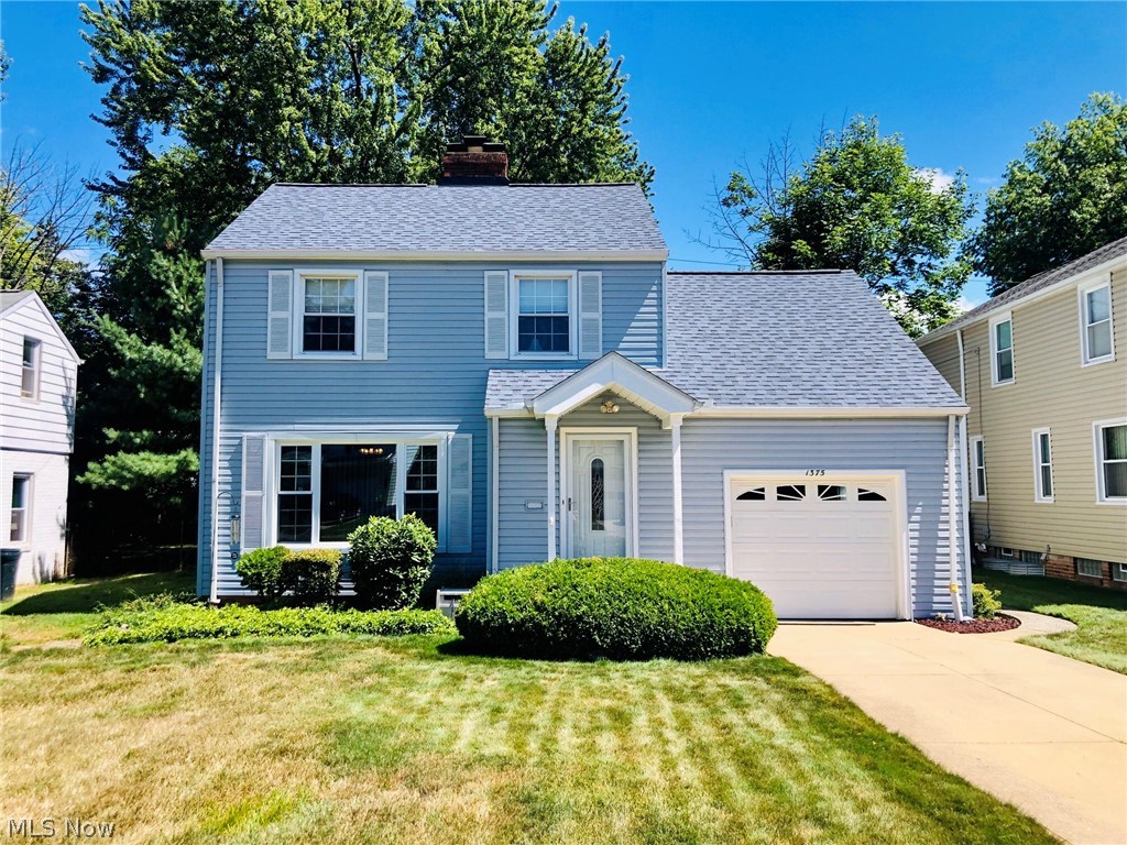 Welcome home to 1375 Grantleigh Rd. Nestled in the heart of South Euclid this exceptionally maintained Colonial is ready for a new owner. Pride of ownership in this home! Close to shopping, schools, colleges, and hospitals this home has been in the same family since 1946! All the expensive updates have been made! New roof along with vinyl siding, gutters, double hung windows, concrete driveway, electrical panel, all news entry doors (4), storm doors and new hardware! New garage door with opener and keypad. The main bathroom was renovated about 8 years ago as well. Enjoy your morning coffee in the 3 seasons room off the dining room with new slider windows. Out back you'll find a private fenced in backyard. Basement features glass block windows. Bring your fresh decorating ideas and just move in. 2 fireplaces and Hardwood floors under all the carpeting. Seller paid Home Warranty from America's Preferred for your peace of mind! Call your favorite Realtor today to schedule a showing. T