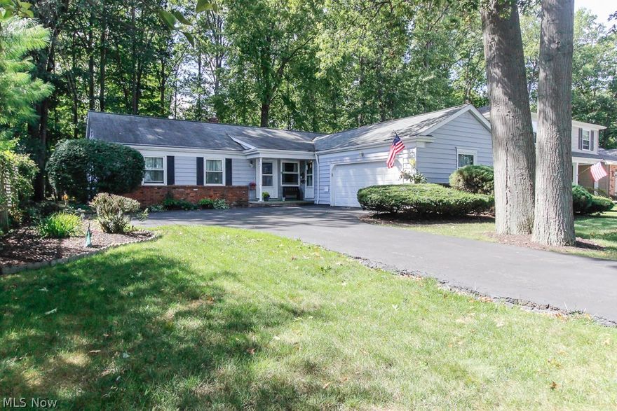 Fantastic Bay Village ranch nestled on picturesque Lake Rd with partial lake views. Functional first floor living offers a welcoming front entrance foyer, spacious formal living room flows into the formal dining room. Eat in kitchen offers all appliances, half bath, laundry and garage access. Look out the windows in the den, office or playroom with built-in shelving and enjoy lake views from across the way. Generously sized master bedroom with in suite full bath with stall shower. There are 2 additional bedrooms and a full bath. Very clean basement is the footprint of the home offers endless possibility for finishing adding several hundred sq ft of living space.  Great deck off the rear of the home looks out to the wooded lot. Serene views allude this home from the inside and out.  Endless possibilities in this rare western Bay Village find!