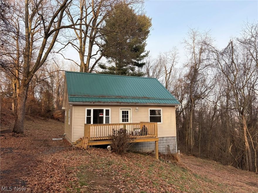 Opportunity rarely knocks twice.  Newly renovated home on secluded 1.83 ac.  New Roof, Decks, Electric Service, Furnace, Air conditioner, paint and flooring.  Propane heat, City water, Septic System, Full DRY basement.  Room to garden!  Shoot deer off your back deck!  Enjoy the tranquility and grandeur of Rabbit Hill!  Get it all right here!