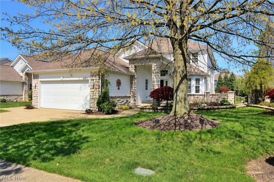 Located in the prestigious Aberdeen community in Highland Heights, this beautifully maintained home offers a bright, open layout with a great room featuring soaring ceilings, a fireplace, and walls of windows overlooking the scenic backyard. The white eat-in kitchen with newer appliances flows into the dining area, while the first-floor primary suite offers dual walk-in closets and opens to a private den, with a separate laundry room and powder room completing the main level. Upstairs includes a spacious loft, two additional bedrooms, one with a walk-in closet, and a full bath off the hall. The finished lower level adds a large recreation room, office or bonus space, full bath, and three walk-in storage closets, providing exceptional storage throughout the home. Step outside to beautifully landscaped grounds with a new deck and patio, complemented by a waterfall feature that enhances the outdoor setting. Additional highlights include a sprinkler system, outdoor security cameras, a heated two-car garage with keypad entry, fresh paint throughout, and excellent storage across all levels. Aberdeen offers an exceptional lifestyle with access to Stonewater’s golf, pool, tennis, pickleball, walking paths, and dining at the Rustic Grill, plus The Yard, a seasonal outdoor gathering space near the 10th tee featuring food trucks, drinks, and live music. All just under 30 minutes from downtown Cleveland.