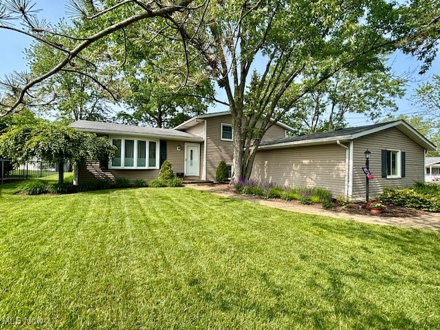 Lovingly maintained and thoughtfully updated over the past two decades, this stunning home reflects true pride of ownership—no corners skipped, no costs cut. Featuring 3 bedrooms and 1.5 bathrooms, every inch has been carefully curated with quality in mind.
The main level showcases beautiful ¾" oak hardwood flooring that flows seamlessly into the upper level and bedrooms. Solid oak interior doors and elegant oak French door add warmth and character throughout. A custom-designed kitchen features a large eat-in island, stainless steel appliances, and flows into an open-concept living and dining room—perfect for everyday needs and entertaining. The sunroom is a standout space, filled with natural light from skylights and a Pella sliding door, offering a tranquil retreat year-round — and with its serene ambiance, it could also serve as a versatile and inspiring home office.
Upstairs, you'll find three generously sized bedrooms and an updated full bath with HEATED tile floors. The lower level offers a cozy family room with a wood-burning fireplace, along with a convenient utility room, laundry, and half bath.
Step outside to an entertainer’s dream: an extensive outdoor living space including a deck, patio, built-in gas firepit, lush landscaping, and Kichler landscape lighting. Updates are too numerous to list—this is truly a must-see property.