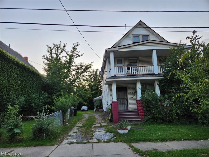 2 homes on one large, partially fenced 54'x140' lot'. The Vinyl-sided 2-family home has long-term tenants paying $450 a month for rent. There are replacement windows and basement glass block windows which were installed in about 2004.  The roof and vinyl siding were installed in about 2008.  The rear wood-sided home is vacant, and had replacement windows installed around 1999.