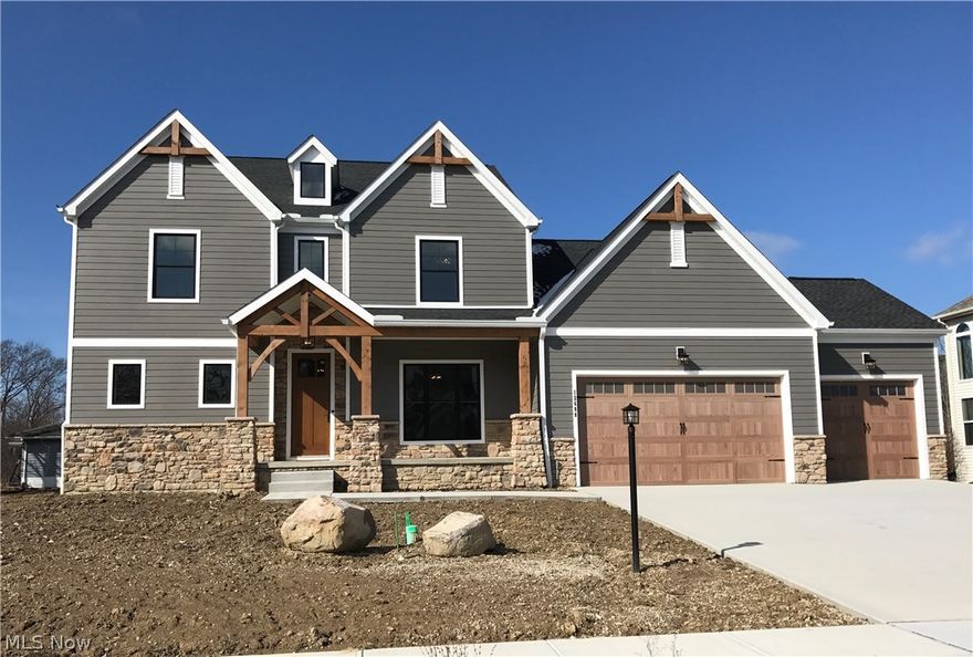Brand new model home just finished Spring 2017! Complete landscaping with full lawn sprinklers, multiple beds, and grass just put in! Come see the fresh new design and finishes in this custom home, which has style and will also help save you money with the upgraded home comfort and efficiency package included! The EKA Build team went the distance to deliver a home that you will not find anywhere else that has the same home efficiency, quality and design!
1st floor master, 3 bedrooms on 2nd floor and large bonus room. 3 full baths and 1 half bath. Covered front porch and rear veranda. Home is complete w/ a DIVINE custom kitchen, one of a kind INSET cabinets, upper glass cabinets, cabinet lighting, and more. Trim details include: shiplap, high wainscoting, custom built-in bookcase, barn doors, beams and much more! Designer flooring, lights, cabinets, etc throughout. Hardwood foyer, kitchen, great room, e-center, and dining room. Tile in laundry, all baths and mudroom. All baths with gra