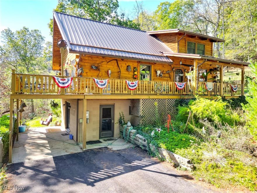 Charming Custom Log Cabin on a Peaceful, Wooded Setting

Nestled among towering pine trees and surrounded by acreage, this stunning custom log cabin offers the perfect blend of rustic charm and modern comfort. The inviting main level features a massive stone fireplace, an updated kitchen, and warm natural wood throughout. A cozy loft area with a private balcony overlooks the great room and can serve as a third bedroom, office, or retreat space, complete with an additional full bath upstairs.

Enjoy relaxing or entertaining on the expansive deck that overlooks the tranquil landscape. The property also includes a two-car garage and a large lower level spanning the full footprint of the home — already equipped with a full bath and ready for finishing touches to add significant additional living space.

A truly special property offering privacy, beauty, and endless potential — the perfect getaway or forever home in a serene natural setting.