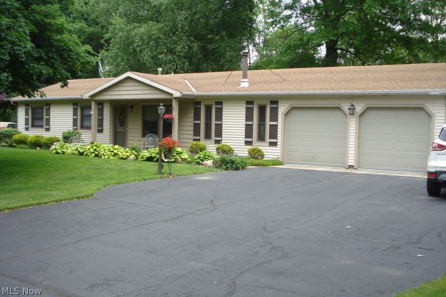 AWESOME 3 BEDROOM RANCH ON BEAUTIFUL PARK LIKE  LOT.  LARGE EAT IN KITCHEN WITH NEW CABINETS, COUNTERTOPS AND FLOORING ALL  NEUTRAL DECOR. FIRST  FLOOR FAMILY ROOM WITH WOOD BURNING STOVE FOR COZY EVENINGS.  OVERSIZE THREE SEASON ENCLOSED PATIO AND OUTSIDE DECK FOR FAMILY AND FRIENDS GATHERING. 2 CAR GARAGE IS HEATED AND SINK.  NEWER ROOF, WINDOWS, WINDOWS, GARAGE DOORS, SIDING. FIRST FLOOR LAUNDRY AREA.  GREAT CURB APPEAL   WOW NOT TO BE MISSED