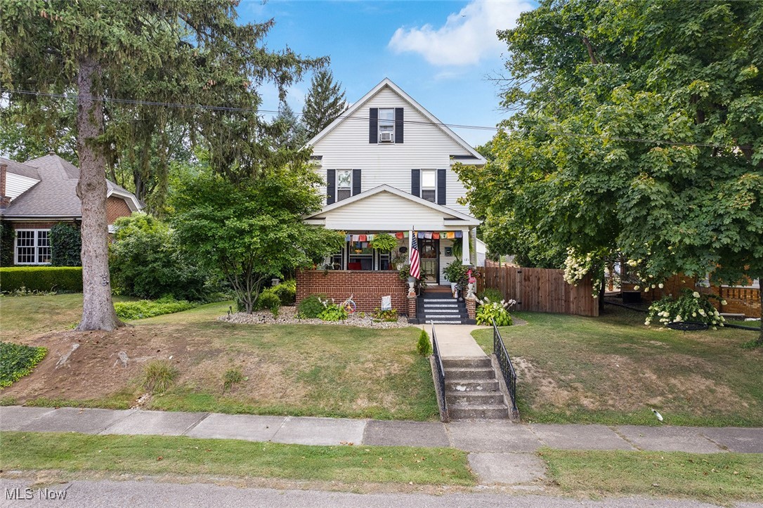 Welcome to this thoughtfully updated 4-bedroom, 2-bath home in the heart of Rittman. The sellers truly pulled out all
the stops, adding custom tongue-and-groove and coffered ceilings for character you won't find elsewhere. The fully
gutted and remodeled kitchen features high-end cabinets and custom appliances, while the upstairs bathroom has
been transformed into a spa-like retreat with a walk-in shower, soaker tub, and a spacious walk-in closet. Original
hardwood floors and charming built-ins run throughout the home, adding warmth and timeless appeal. The bedrooms
are generously sized, and the finished loft area offers incredible versatility - perfect for a large bedroom, office, or play
space. Step outside to enjoy the fully fenced backyard with a brand-new covered patio. The location truly can't be beat,
just a short walk to the football field and close to the local school and downtown. This home is perfect if you are
looking for a blend of modern updates with classic charm, with move-in features both inside and out.