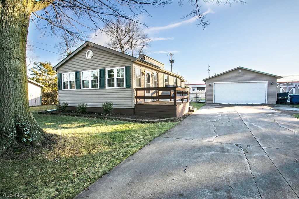 I'LL TAKE IT! Will be the first words you say when you see this adorable ranch home located on dead end street. A beautiful family room with fireplace makes living a joy in this 2 bedroom vinyl sided ranch. Features great room with vaulted ceiling; open concept between kitchen and large dining area; built in oven and cooktop plus refrigerator in kitchen; double oversized heated garage with utilities plus another attached garage making it ideal for car enthusiast or wanting that extra space; deck with retractable awning and double concrete driveway. Visit this home today! SELLER HAS RECEIVED MULTIPLE OFFERS, HIGHEST AND BEST DUE BY WEDS 1/4/2023 @3 o'clock.