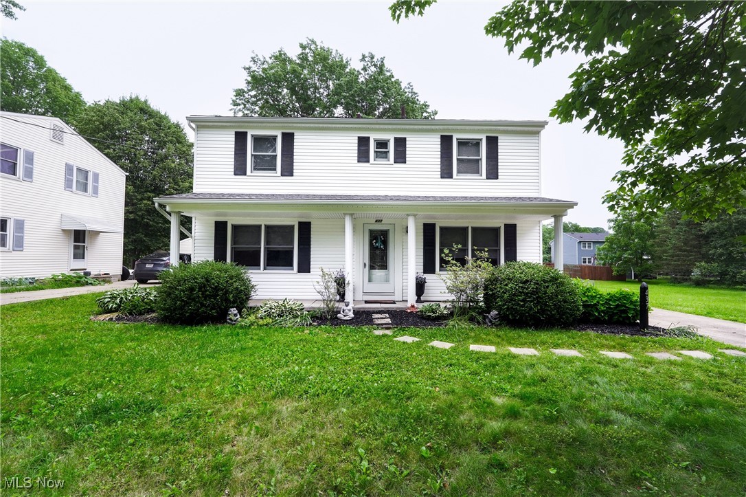 Discover this charming Colonial in Fairlawn, a stunning home that is truly a hidden treasure. As you approach the property, you’re instantly greeted by the expansive yard and delightful front porch. Step inside to space and comfort with the first floor boasting multiple living areas that offer plenty of space for any lifestyle and numerous options for entertaining. With an updated 1/2 bath next to the kitchen and dining area, it is the perfect place for preparing and enjoying your meals. Then you can unwind by the fireplace on new carpet in the living room or head to the 3 seasons room in the rear with full sliding glass doors! Venture upstairs to find four bedrooms equipped with ample storage, along with two full bathrooms, including a primary suite featuring an updated private bath. Retreat to the partially finished basement with new carpet and LED lighting, which makes for an ideal office, additional bedroom, workout space, or recreation room. Fresh paint throughout the interior. Recently power-washed! The yard is perfect for hosting gatherings or cultivating your own summer garden. Located just moments away from the fantastic Sand Run Metro Park, Summit Mall, shopping, and dining options, this opportunity is one you won't want to miss!