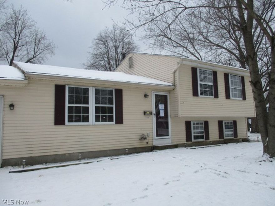 Room to grow in this three bedroom aluminum sided tri-level. Kitchen with eating area that has sliders to the patio. Spacious living room. Family room. Central air. Basement. One car attached garage plus a concrete pad for more parking. Plus more! Great location, near schools, parks, shopping, entertainment and bus line. With a little paint and carpeting, this could be a great home!