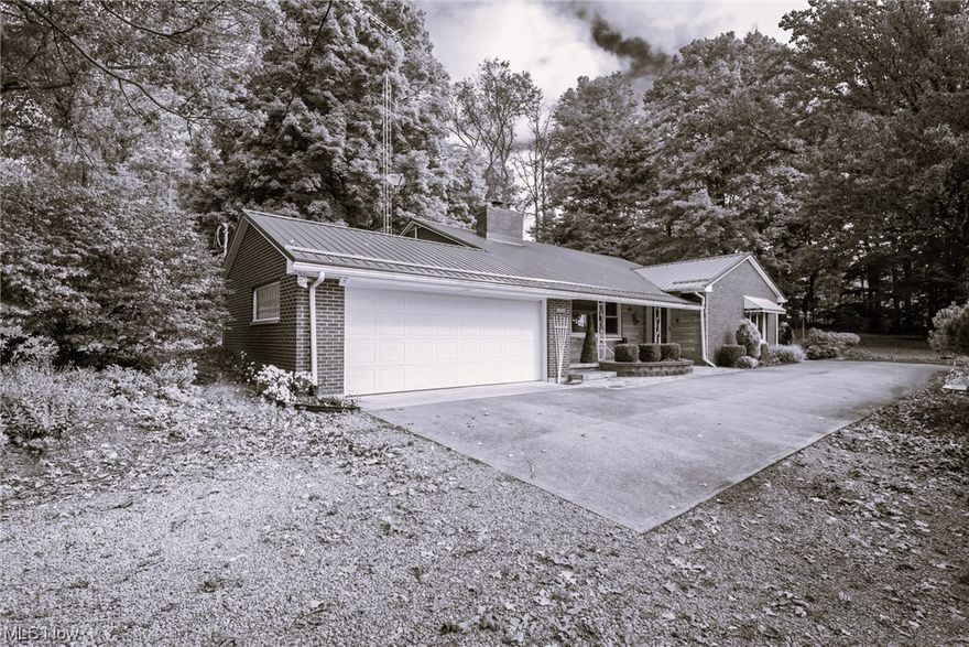 Looking for peace and privacy? Located in United school district, this home is just minutes away from Guilford Lake, which offers swimming, fishing, boating, camping, trails, and playgrounds! Situated on a 2.32 acre lot, the mature trees provide a tranquil environment for you to enjoy the nature around you.  There is a large outbuilding with a concrete floor, electric and water, and also a shed for additional outdoor storage.  Inside, the kitchen has plentiful cabinets and features spacious Corian countertops. There are 3 bedrooms, and full bathrooms on both the upper and lower levels, and the lower level bathroom has been remodeled.  The outside features a large patio perfect for entertaining.  Don't let this one pass you by!