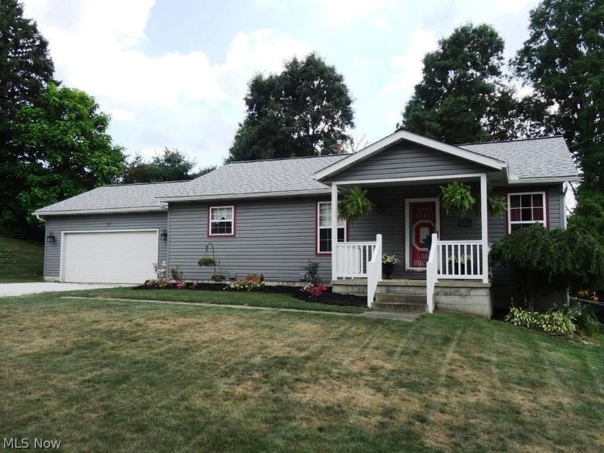 Hard to find pristine newer Tallmadge ranch! This home offers charm, quality, updates galore, and tons of living and entertaining space! The main floor features an open concept kitchen/dining space that opens into the living room, with a gorgeous 3-sided gas fireplace!  Kitchen comes with hardwood flooring and all appliances! Spacious master suite is equipped with a full bath, walk-in closet + door to the deck!  there is another full bath and two nice sized bedrooms to complete the main floor. You will be wowed when you enter the lower level, which offers a huge 23x14 rec room, walk-out to the back yard, another gas fireplace, private office space w/hardwood flooring, a bar area w/ceramic flooring (bar included!), and a very spacious third full bathroom!  The back yard offers private space for entertaining, a huge multi-level deck, partially covered with awning, and a nice yard space. Major updating includes, roof 2012, siding 2012, hot water heater 2015, furnace 2013, dishwasher 2016,