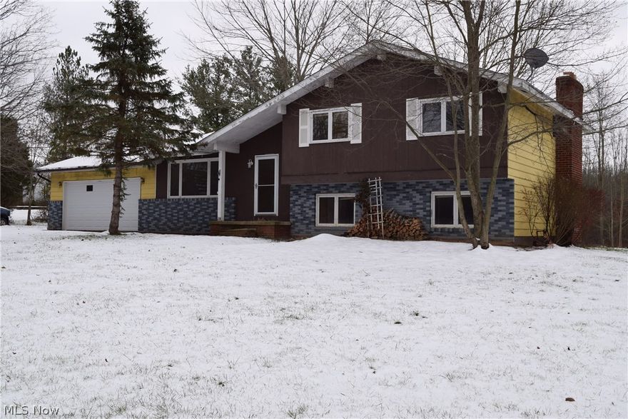 Spacious 3 bedroom, 2 bath split-level. Once in, you are greeted by the generous, vaulted living room open to the dining room and kitchen- a perfect layout for entertaining! The tasteful kitchen employs amble cabinets/ counter space  & all appliances stay. On the second level, there are 3 bedrooms and 2 full baths. Finished lower level boasts a large family room with a warm and cozy brick fireplace and paneled walls. Another full bath and an additional bonus room w/large closet, could be a home office or guest room.  Backyard offers a nice patio, perfect for all your entertainment needs! All of this on a beautiful deep lot!! Fresh paint, new bedroom doors & updates to bathrooms. One year home warranty offered. Please call today for a private tour.