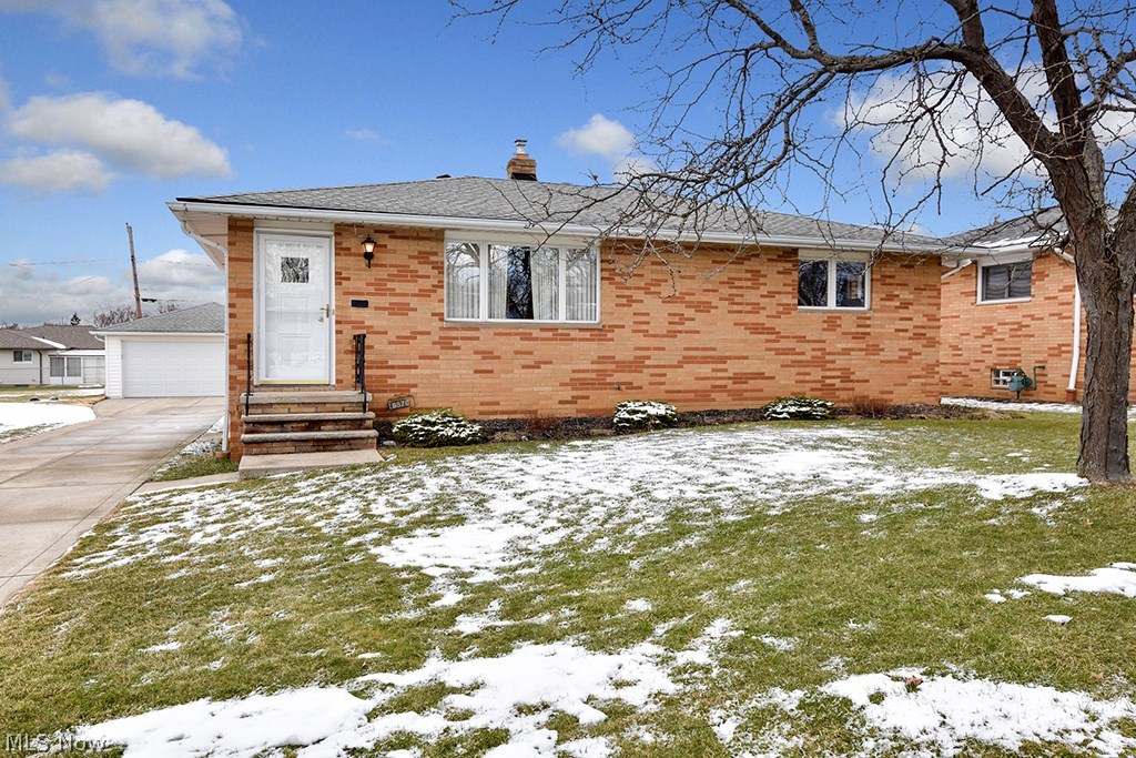 Beautiful one-owner solid Brick Ranch. Living rm has carpet over hardwood flooring. Updated eat-in kitchen w/laminate flooring. All appliances remain. Updated full bath, 3 bedrms w/good sized closets. Lower level has a finished rec rm & large utility & storage side. 2-Car garage w/newer door. Huge backyard -- all fencing is neighbor's. Furnace, A/C, & H2O tank all new 2016. Roof 2004. Driveway 2000. All newer interior doors.