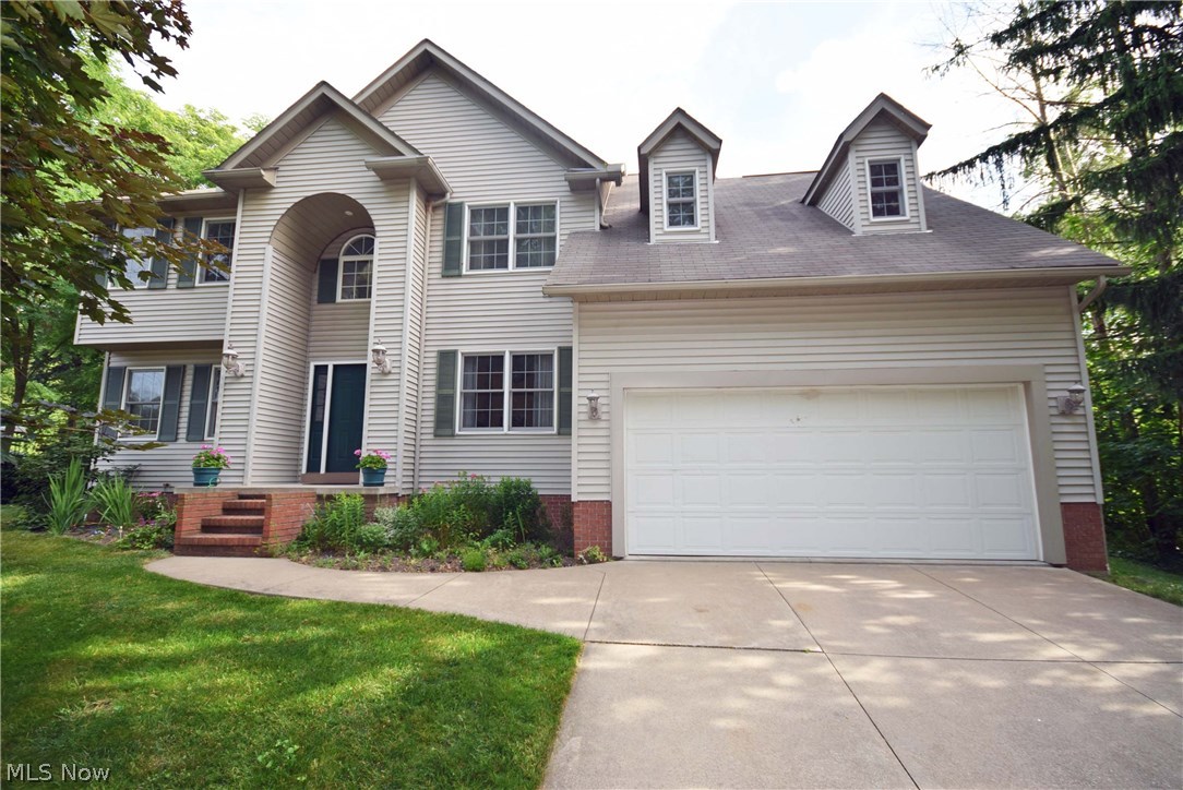 Get ready to enjoy summer! This property has it all. Gorgeous in-ground pool, spacious patio and private park-like backyard. Open the front door and you're greeting by a spacious 2-story foyer with oak hardwood floor and turned staircase. Spacious living room with attractive gas fireplace. Bayed dinette and gourmet kitchen w/ island & planning desk. First floor laundry and half bathroom. Master suite has 2 walk-in closets, shower, and garden tub. Large 2nd floor hallway leads to bedrooms 2, 3 & 4. Rec. room and activity room finished in the basement with tons of storage space. Great opportunity to live in Green outside of a typical neighborhood with tiny lots! The privacy and outdoor space create the best setting in Green just minutes from everything! Call today to schedule your showing. Don't wait til it's sold!