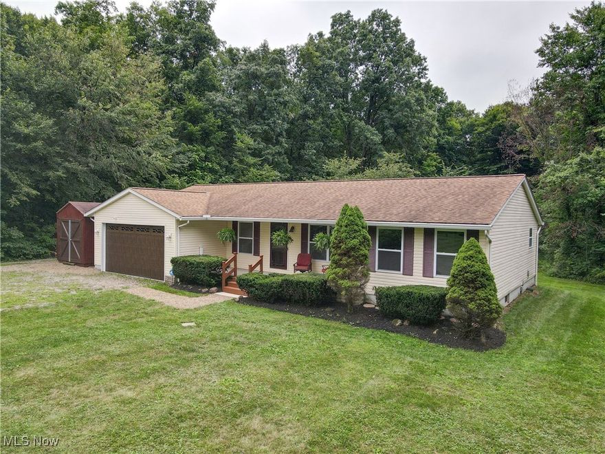You've found it! Welcome to this beautifully maintained one owner ranch home found in a serene wooded setting. This home was built by Wayne homes in 2003, the roof was completely replaced in 2017 and the gutters, furnace and AC were replaced in 2023. In addition to the attached garage, there is an additional oversized two car garage (32 x 24) and a separate storage shed for all your tools and equipment. The home has 200 amp service to take care of all your workshop needs. For peace of mind, a septic inspection has been completed.  Once inside, enjoy the open living, kitchen and dining areas with the bedrooms tastefully tucked on either side of the home.  The master suite features a slider opening to the patio and deck.