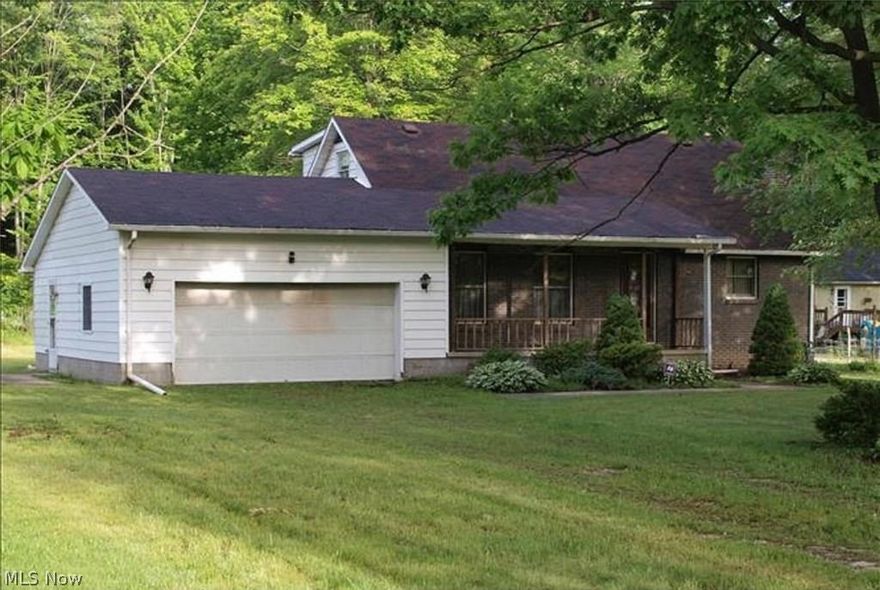 Nice 1.5 story home in Brookfield, featuring utility room off garage rear. Florida room not added in sq ft. Large eat in kit, 2 Bdrms, and living rm and bath on 1st floor and 2 Bdrms and bath on 2nd floor. 2 parcels - L shaped lot. New flat roof, in rear. (Purchasing "As-Is Buyer responsible for Well and Septic inspection per Trumbull County Health Dept Regulation.)