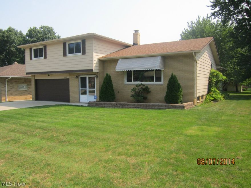 5 BEDROOMS!!! -FIRST FLOOR IN-LAW SUITE OR COLLEGE SUITE plus 4 Bedrooms. In -Law suite has a shower and toilet, this room can be as a family room as well, separate entrance. First Floor Laundry Room, Washer & Dryer Included. First Floor 1/2 bath. Beautiful HARDWOOD FLOORS thru out. Newer Roof, Driveway, Siding, freshly painted thru-out. Basement includes a 20'x13' finished area.  This home has newer Stanak WINDOWS thru out.  Outside features include a covered porch patio area, and a nicely finished 2 car garage with hot and cold water. Cabinets thru out in garage for lots of storage. 1 Year Home Warranty Provided by Sellers. Take a Look and MAKE AN OFFER..