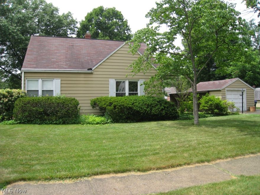 Darling Ranch west of State Road on a pretty corner lot. 2010 New Furnace and Central Air. Vinyl replacement windows, newer kitchen and bathroom flooring & faucets. Front door, glass block basement windows, refrigerator and gas range/oven to remain.  Spacious living and dining.  Cute kitchen. Rich hardwood floors. Full basement.  One car garage.  Priced to sell.  Won't last!