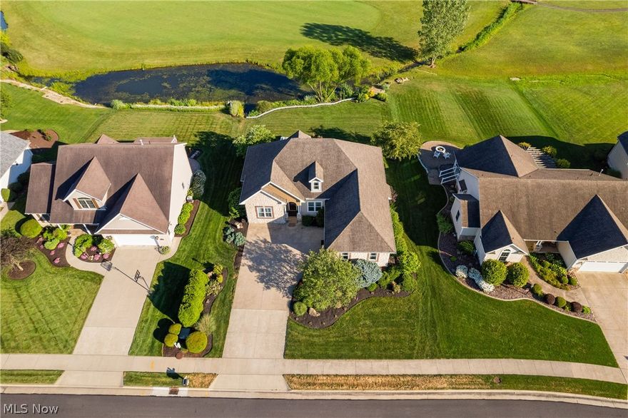 Ranch home with ideal open concept floor plan and gorgeous golf course and pond views. Updated include a new kitchen with stainless steel gas range, refrigerator, and a tile walk-in shower in the master. The home features a great room, formal dining room, main floor laundry, a split bedroom floor plan with a master suite, two additional bedrooms with Jack and Jill bath, and half bath. Huge full basement with tons of room for entertaining. 2-car attached garage. Inviting deck off the back and stamped concrete patio.