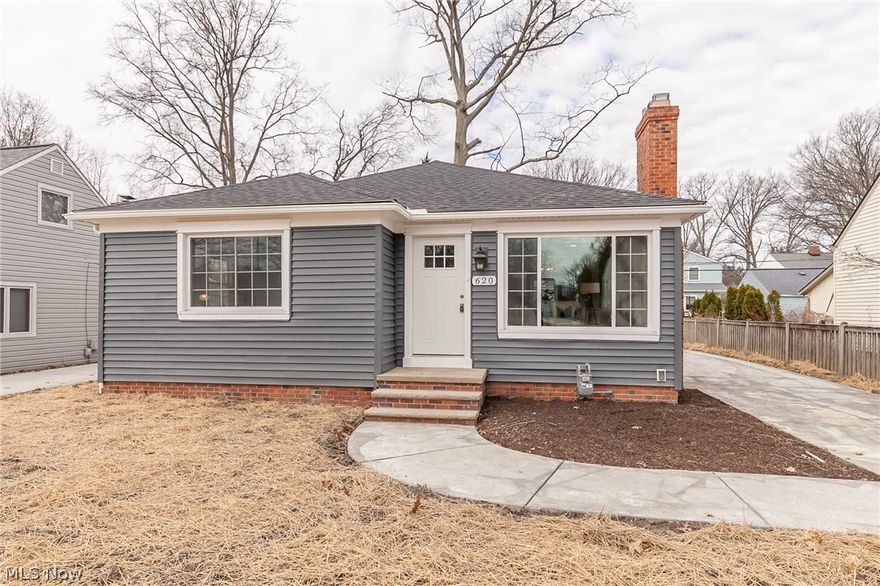 Get ready to fall in love with this completely remodeled 3 bedroom, 2 bath Ranch nestled on a cozy street in Bay Village. The exterior supplies many important improvements including new windows, roof, driveway, siding & landscaping. Come inside to find a custom open concept floorplan. The living room displays a wood burning fireplace, fresh interior paint and gleaming refinished hardwood floors that flow throughout. The delightful dining boasts beautiful custom millwork, trey ceiling & convenient sliding door. The vaulted kitchen w/ skylights is sure to please, with new custom shaker white cabinets, marble countertops, recessed lighting and upgraded stainless steel appliances. On the first floor you'll also discover 3 generous bedrooms all w/ beautiful hardwoods & a remodeled full bath with skylight, marble floor, double vanities, two shower heads and relaxing tub. The finished lower level is home to the sprawling family room including an additional full bath, fireplace and laundry roo