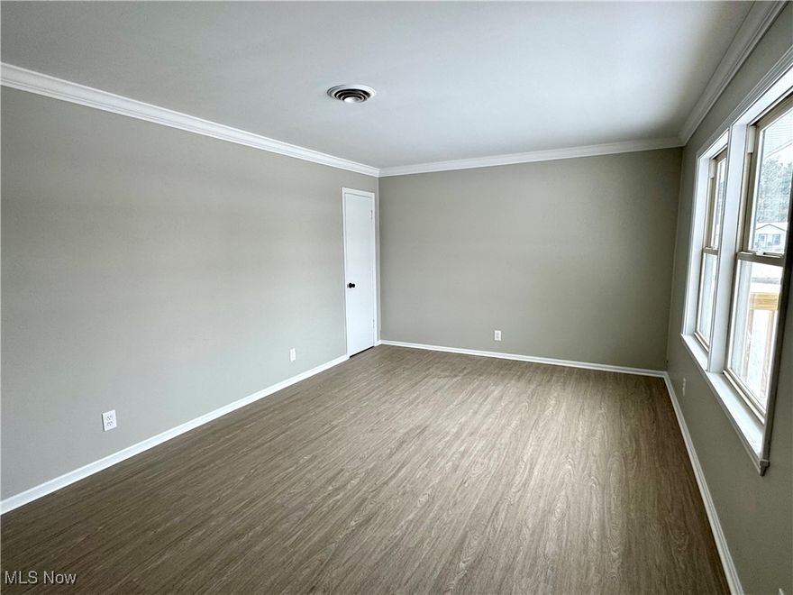 Welcome to this beautifully remodeled 3-bedroom, 2-bath ranch home situated on a flat, spacious lot in a prime location. This move-in ready home features a brand-new kitchen complete with modern appliances, sleek cabinetry, and stylish quartz countertops. Enjoy all-new flooring throughout, updated lighting, fresh paint, and stylish new bathroom vanities. The newly added deck provides the perfect space for relaxing or entertaining and the finished basement provides extra living space. Additional updates include new vinyl siding, new garage door, and new exterior doors. Conveniently located and fully updated, this home offers comfort, style, and functionality for its next owner. Don’t miss out—schedule your showing today! Agent owned.