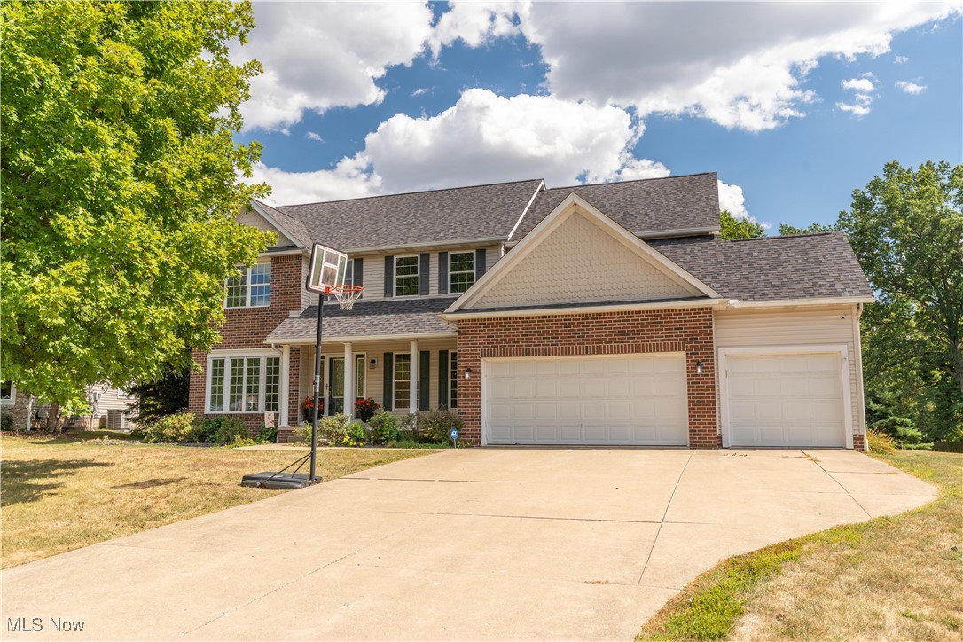 **OPEN SUNDAY, 9/14 FROM 2-4** Welcome to this Jackson Township beauty in Greenbriar Woods! This 4–5 bedroom, 3.5 bath colonial offers over 2,800 sq. ft. with hardwood floors throughout, a large great room with soaring ceilings, wall of windows, and gas fireplace, plus a fully applianced kitchen with island, double ovens, refrigerator, dishwasher, walk-in pantry, and dinette that opens to the deck and patio overlooking a partially fenced backyard on a .63-acre lot. Available for immediate possession. The first floor features a formal dining room, den/office, and a versatile bonus room that can serve as a fifth bedroom or in-law suite, along with a convenient laundry room. Upstairs, the spacious primary suite includes double door entry, walk-in closet, and spa-like bath with dual vanities, soaking tub, and separate shower, while the additional bedrooms, including a junior suite with private bath, all showcase beautiful hardwood floors. Completing this home is a full basement, attached 3-car garage, covered front porch, and ample outdoor living space, making it the perfect combination of style, comfort, and functionality