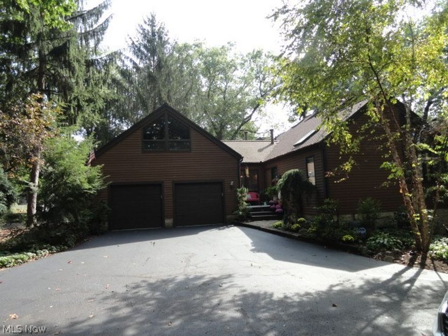 Absolutely stunning condo in Meyer's Lake. It is completely updated with an open, bright floor plan. This condo also has a walk out lower level with a wet bar.  There are two fire places- one on the first floor and second one on lower level.  This fabulous condo is on a dead end street with lots of extra parking.  You also have lake access for boats as well as a dock and clubhouse. There is also a private 3rd bedroom suite or office on second floor above garage. New roof 2015 and 5 new sliding doors.