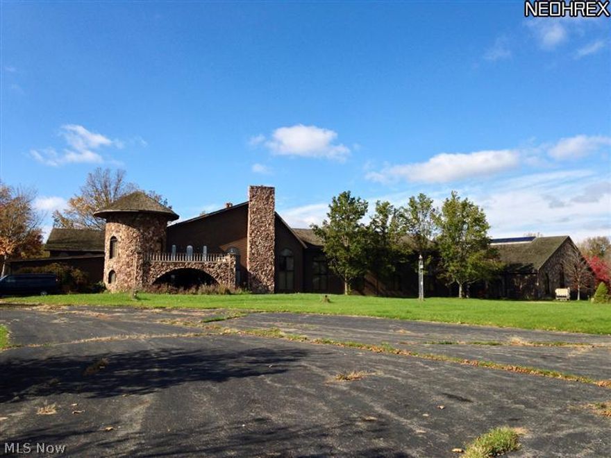 Enjoy a private gated retreat on over 60 acres (2 parcels) that adjoins golf course on NorthWest side.  Separate house for family or guests includes approx 4-5 additional bedrooms and upgraded septic.  Grounds have paved walking paths, overlooking 2 lakes, accomodations for large outdoor pets, outdoor basketball court.  Indoor pool facility.  Potential is endless.