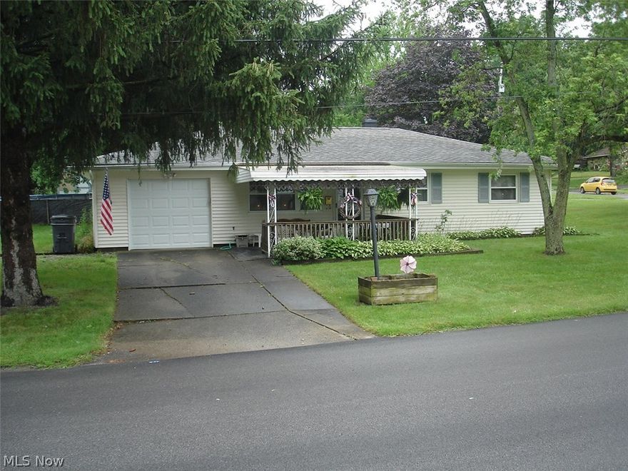 Sharp vinyl sided 2-3 bedroom ranch  Nice living room, dining room, kitchen wit appliances, laundry room with washer and dryer, central air, attached garage with opener, nice front porch and much more.  Newer shingles, replacement windows.  Plenty of parking.