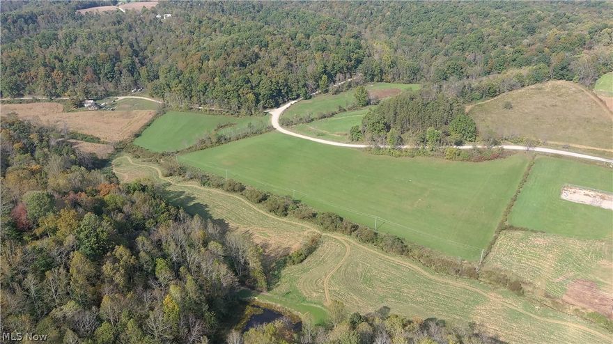 Onsite Auction: Saturday, November 20th, 11:00 AM. Home open for Inspection and ATV Tour: Tuesday, Nov 2nd from 4:00 to 6:00 PM. Located just minutes west of Salt Fork State Park and 5 miles north of Cambridge, here’s an exceptional opportunity to buy property in a picturesque valley. Tract 6: 9.1+/- Acres, 819’ of frontage on Lemon Hill Rd. Gently sloping, bordered to the rear by a small creek, and currently in hay, this tract would make an ideal building site.