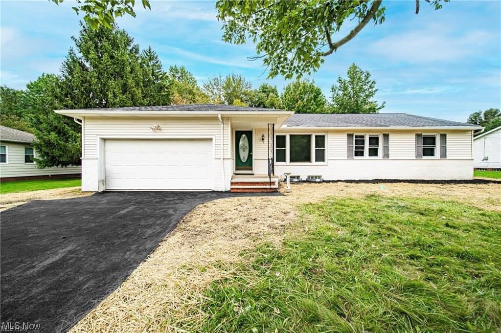 Completely Renovated Inside and Out! Mayfield Village Ranch with Open Floor Plan and Luxury Finishes! Kitchen Features: Quartz Countertops, Loads of Cabinet Space, Stainless Steel Appliances and Modern Light Fixtures! Primary Suite offers a Beautiful Updated Bathroom with Tiled Shower and Glass Doors. In addition to the 3 Spacious Bedrooms, Enjoy a Private Office with Barn Doors! Deck (2023) Overlooks the Gorgeous Parklike Fully Fenced Backyard. Other Features Include: Updated Plumbing, Electrical Panel, Flooring, Light Fixtures, Driveway, Paint, Basement Waterproofing with Sump Pump, Neutral Decor throughout and Much More!! Schedule Your Showing Today!