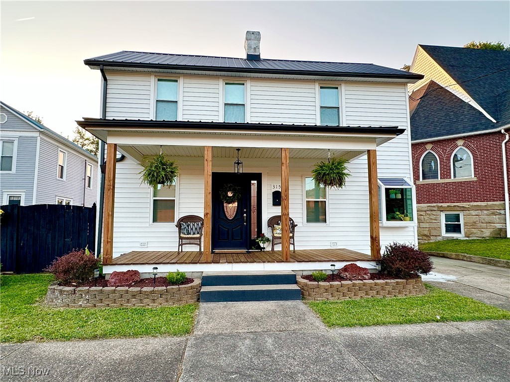 Conveniently located in town and cute as a button! This beautifully updated 3-bedroom home offers the ultimate blend of tranquility, natural beauty, and coziness. Come unwind in the back yard lounging on the patio and by the tiki bar or enjoy the warmth in the adorable sunroom overlooking the river. Take pleasure in the direct access to the water and the benefits of your own dock. Inside you will find a large eat in kitchen and inviting living room featuring a stunning fireplace. This is a home you do not want to miss! Too many updates to mention. All measurements are approximate.