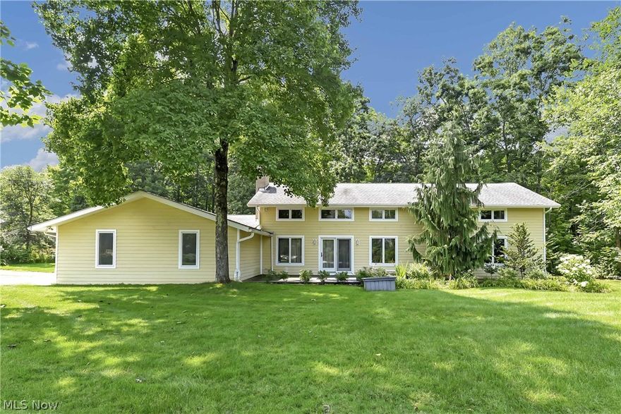 Prepare to be Moved!...into this rebuilt (2006) from the foundation up "LIKE NEW" home situated on 2 picturesque acres in Hinckley Twp! Thoughtfully designed and BUILT WITH QUALITY materials, finishes, and mechanicals including Geothermal climate control. Step into the welcoming foyer & flow into the cozy family room with triple wide windows, built-in bookcases & vaulted ceiling. Cathedral ceilings greet you in the expansive Great room where the gleaming honey-toned wood floors are only outdone by the stunning floor-to-ceiling stone w/b fireplace. Convenient access to both the front & back decks provides perfect flow when entertaining. The kitchen is impressive with contemporary custom hickory cabinets, stainless appliances, quartz countertops and porcelain tile floor. The enormous Primary Suite features his & her closets & an ensuite bath. 2 additional bedrooms share the 2nd full bath on the first floor.  Convenient 1st-floor laundry room.  Look out over the great room from the airy l