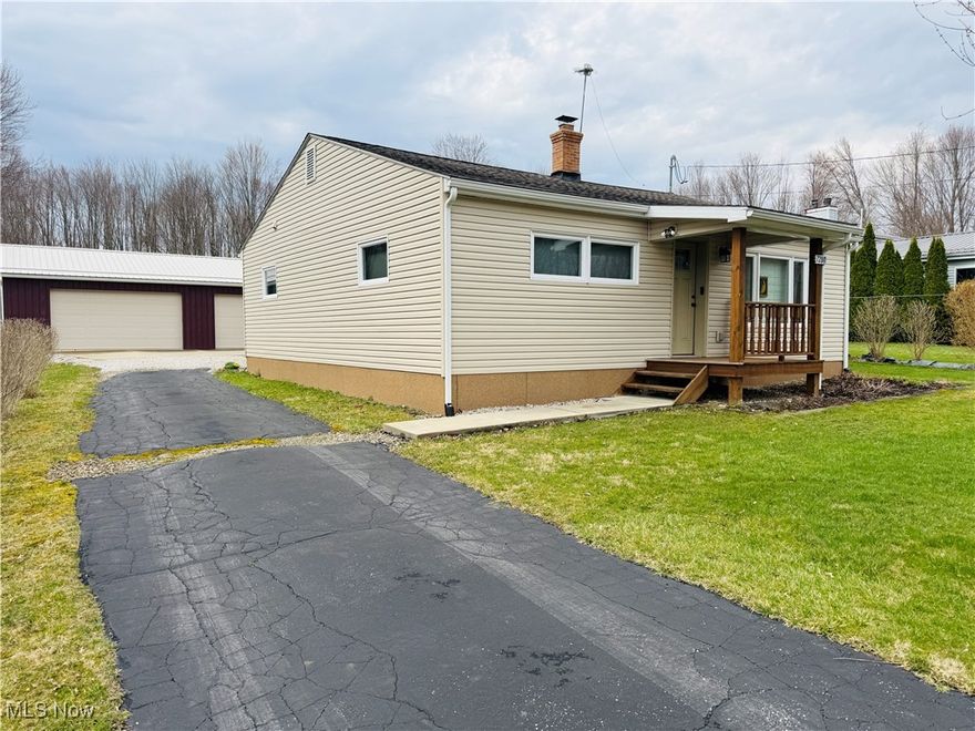 Dreaming of your own PRIVATE BOAT DOCK,  Then Welcome Home!!! Make every day a vacation in this ranch lake view home. This is a rare opportunity to own a slice of paradise right on the shores of Pymatuning Lake .  This adorable lakeside home has been updated, all you need to do is move in. There are 2 bedrooms and 2 full bathroom, large eat-in-kitchen with plenty of cabinets and counterspace. Off the kitchen is the large family room with a wood burning stove to keep you warm on those cold winter nights. There is also a living room with beautiful tongue and groove wood on the walls. Spend your morning having coffee on the covered back patio.  There is a new 3 car fully insulated 37x28 garage with heated office/work station with plenty of storage.  Enjoy picking apples, pears and peach's and blueberries from your own yard. UPDATES: hot water tank 2024, new windows, water softener, siding, A/C, new electrical panel, new kitchen with appliances, updated bathrooms, electric in the garage and so much more.  MUST SEE!!!