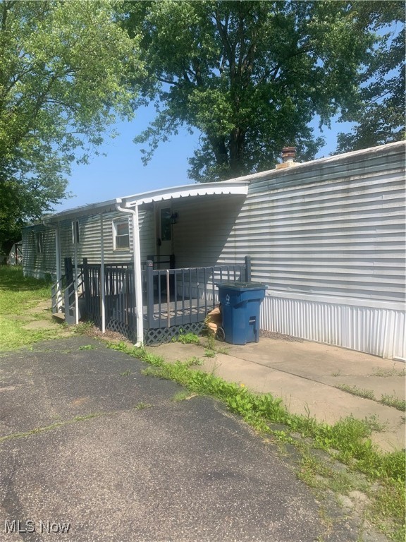 Great investment home 3bed and 2bath home. Great location and close to everything. The home is tucked away in a country like setting. Water and heat is in good condition. Blue Water Manor is located in a beautiful, quiet country setting. They offer a large playground, basketball court, and baseball field for all ages. They also have a community center that can be used for gatherings and birthday parties. Close to shopping 5-15 minutes away for venues, Plaza's, Eateries and fine dining. 7 miles from Lake George Village , 10 miles from Wild West and Magic Forest , 11.5 miles for The Adirondack Outlet Mall , 13 miles from Six Flags Great Escape Lodge & Indoor Water Park. Property Being SOld AS IS. The Price drop reflects that.