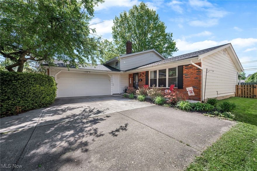Thoughtfully updated and move-in ready, this 3-bedroom, 1.5-bath split-level offers 1,992 sq ft of functional living space, a fully fenced backyard, and attached 2 car garage. The remodeled kitchen features soft-close cabinetry, quartz countertops, stainless steel appliances, and a subway tile backsplash. An open-concept main living area with newer LVT flooring flows into the dining area, with sliding doors leading to the backyard. The lower-level family room offers more living space with a brick wood burning fireplace and generous natural light. Many updates have been done since purchasing the home. These updates include: roof replacement with new gutters and covers (2021), all kitchen appliances replaced (2022), LVP flooring added on the main level, half bath remodel (vanity, mirror, light fixture, toilet), interior of home painted, garage man door/main entry door replaced with insulated door, revised kitchen layout, and much more... INCLUDED are all kitchen appliances, washer/dryer, piano, kitchen island, pot holder, window treatments, and 1-year home warranty. This home is in a great location and conveniently located near I-480, I-71, easy access to shopping, parks, and everyday essentials. North Olmsted Community Park and top-rated schools are also just minutes away. Schedule your tour today!