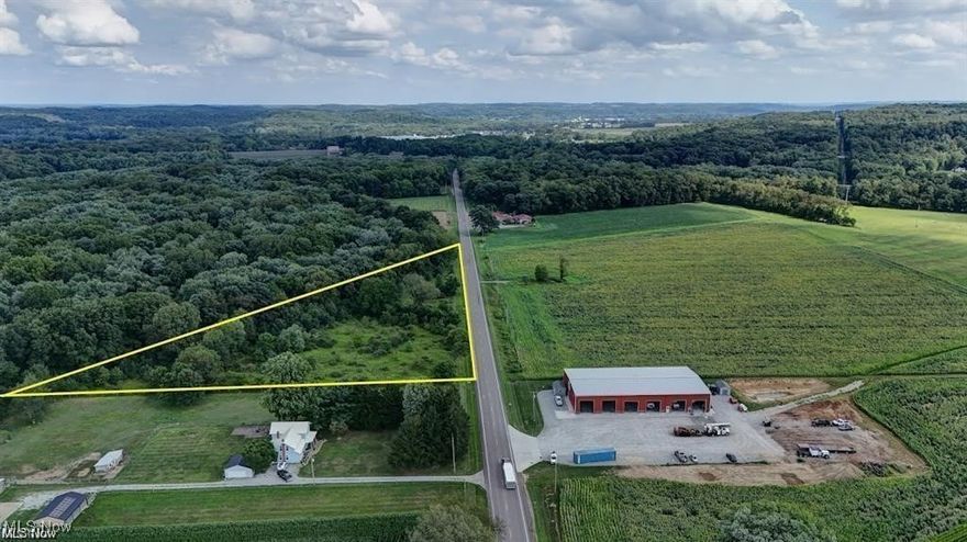 Flat and ready for your finishing touches. 4.78 acres just outside go Strasburg and Beach City. Perfect location for whatever you are looking for. No zoning. Land is adjoining to 440 +/- acres of Muskingum Watershed. Opportunity awaits!