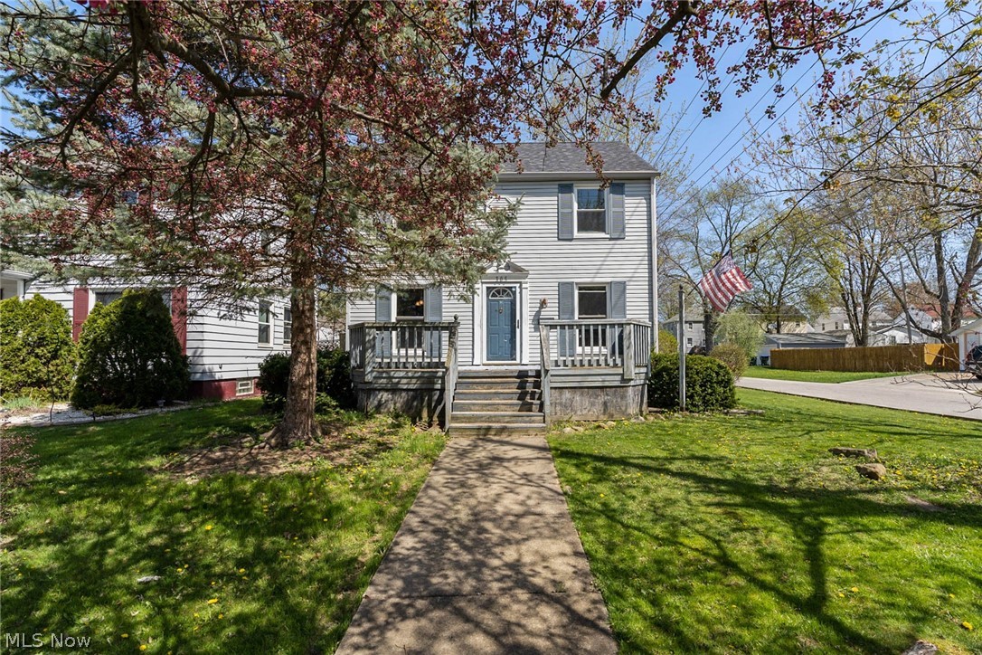 You will fall in love with this gorgeous this beautiful 3 bed/ 1.5 bath Colonial! You are welcomed into the large living room and dining room with newly finished, beautiful hardwood floors. Off the dining room is the kitchen with all appliances included. The partially finished basement with half bath is perfect for an additional family room. One year home warranty included! Close to schools, parks and the downtown Cuyahoga Falls Front Street. Don't miss this one, schedule your showing today!