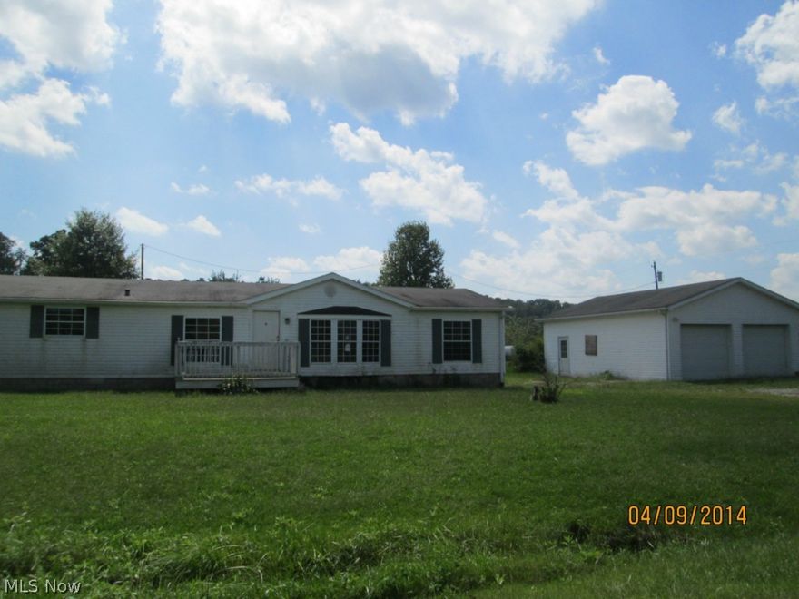 Large 3 bedroom 2 bath manufactured home on 1.28 acres in Tri-Valley schools! Home has a 2 car detached garage and is on a nice level lot. This property is priced to sell! Don't miss it!